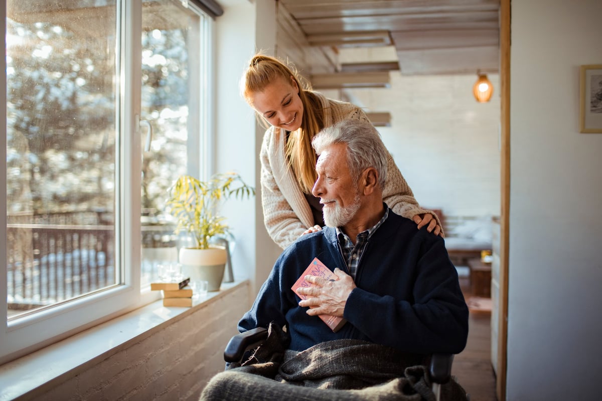 Caregiver helping senior at home